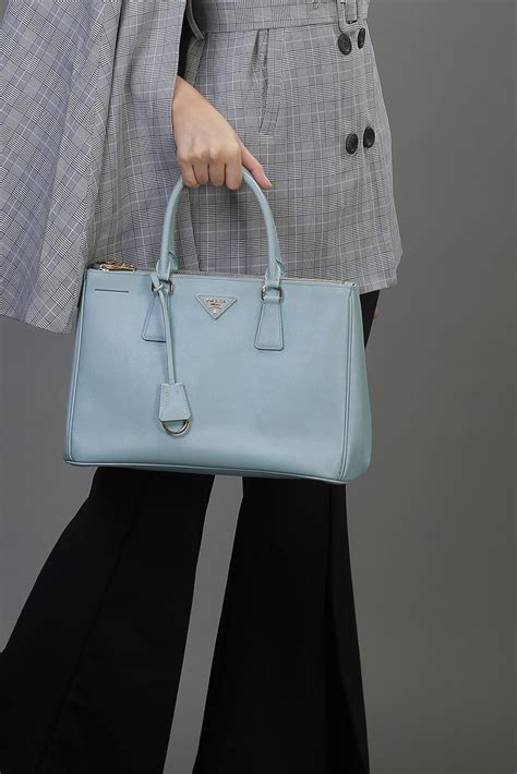 Prada light blue saffiano handbags